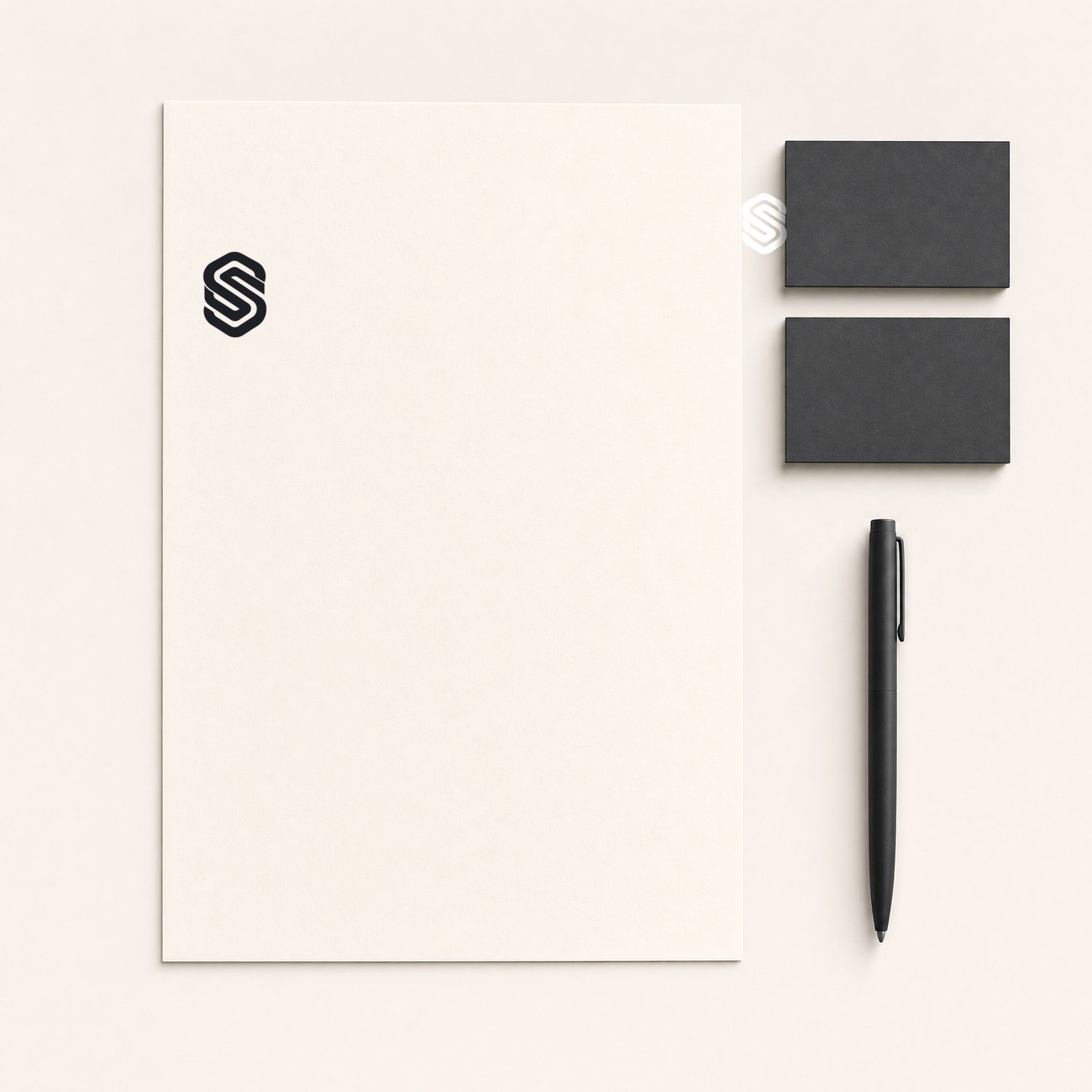 Synthera Systems stationery flat-lay